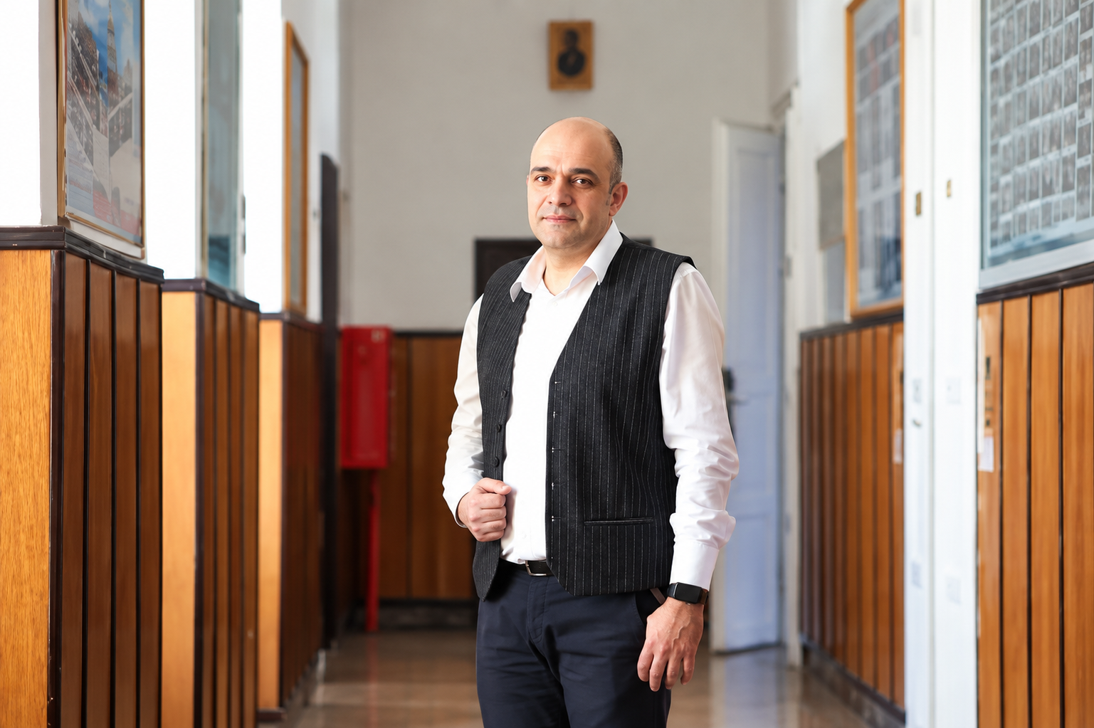Professional Portrait in a Wood-Paneled Hallway